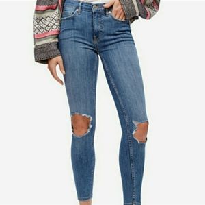 Free People Medium Wash Demin Jeans with knee rip